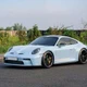 Porsche 911 GT3 từng của Cường Đô la được dán đổi màu xanh ngọc bích