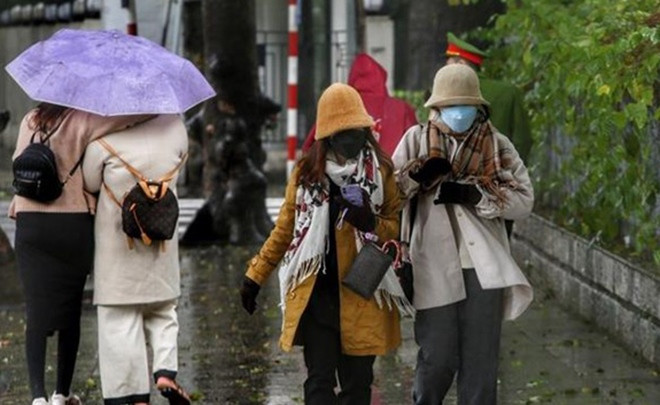 Hà Nội mưa nhỏ, sáng trời rét. - Ảnh: Internet.