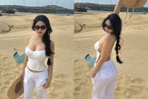 'Cô bé bán quần áo' hot nhất Sài thành khoe dáng nóng bỏng trên đồi cát