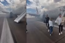 Máy bay chở 173 người bốc cháy khi cất cánh, hành khách tháo chạy