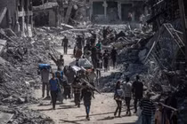 Hình ảnh người dân Palestine trở về khu phố đổ nát ở Gaza