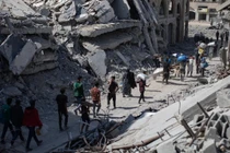 Hình ảnh người dân Palestine trở về khu phố đổ nát ở Gaza