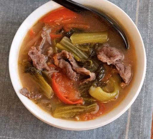 Thịt trâu nấu dưa chua: Vị chua của dưa muối cũng góp phần tạo cho món ăn sự thơm ngon hơn. Thịt trâu mềm mềm, dai dai và ngọt ngọt kết hợp với một vài miếng dưa chua giòn giòn chắc chắn sẽ đưa cơm hơn rất nhiều. Thử ngay món này khi thời tiết se lạnh để cảm nhận rõ sự tuyệt vời của món ăn. Ảnh Internet Thịt trâu nấu dưa chua: Vị chua của dưa muối cũng góp phần tạo cho món ăn sự thơm ngon hơn. Thịt trâu mềm mềm, dai dai và ngọt ngọt kết hợp với một vài miếng dưa chua giòn giòn chắc chắn sẽ đưa cơm hơn rất nhiều. Thử ngay món này khi thời tiết se lạnh để cảm nhận rõ sự tuyệt vời của món ăn. Ảnh Internet