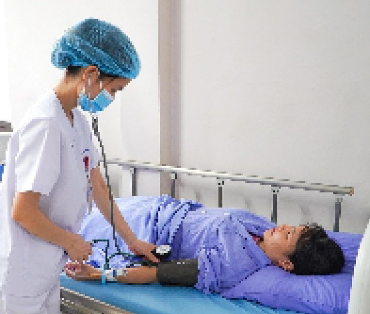 Bệnh nhân H. nằm điều trị tại khoa Nội tổng hợp. Ảnh BVCC