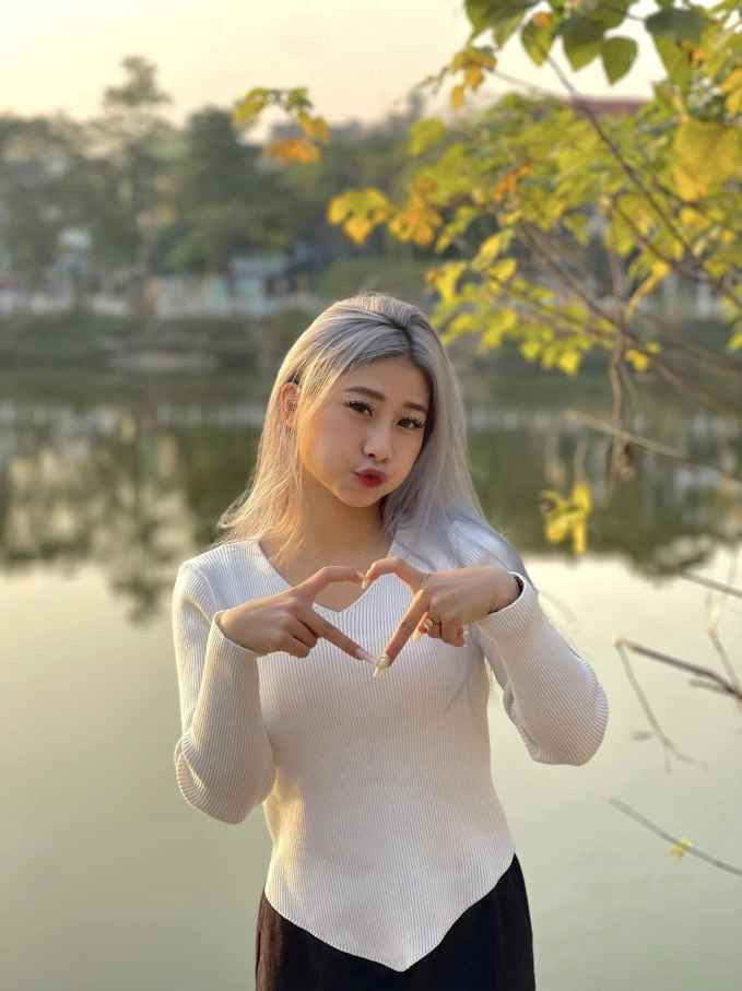 Hot girl TDDC Pham Nhu Phuong dien ao dai xinh don Tet-Hinh-6