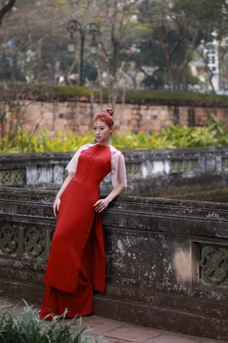 Hot girl TDDC Pham Nhu Phuong dien ao dai xinh don Tet-Hinh-4