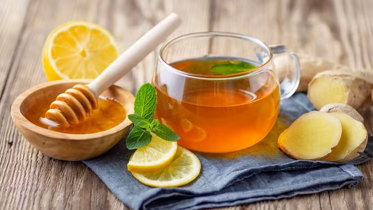 Nước trà gừng, mật ong giữ ấm phòng ngừa bệnh cúm.
