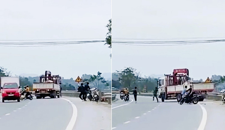 Xe tải bị nhóm thanh niên đập vỡ kính chắn gió, gương chiếu hậu.