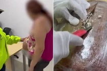 Cô gái trẻ giấu ma túy trong bụng bầu giả