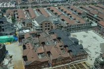 Trung Quốc dùng 432 robot nâng cả khu nhà cổ 7.500 tấn 