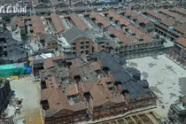 Trung Quốc dùng 432 robot nâng cả khu nhà cổ 7.500 tấn 