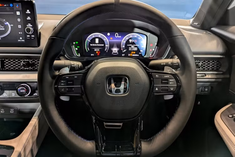 "Soi" Honda Prelude e:HEV 2026 thể thao đẹp mắt lại tiết kiệm xăng - Hình 6 Nó hoạt động với hệ thống Active Sound Control (ASC) phát âm thanh qua loa. Mặc dù hệ truyền động này không có bộ chuyển đổi mô-men xoắn và hoạt động với hệ thống ASC nhưng nó vẫn duy trì tốc độ động cơ khi giảm số để đạt hiệu suất tối đa.