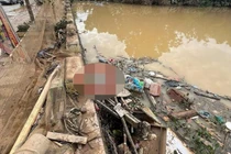 Phát hiện thi thể người đàn ông dưới hồ nước sau lũ 