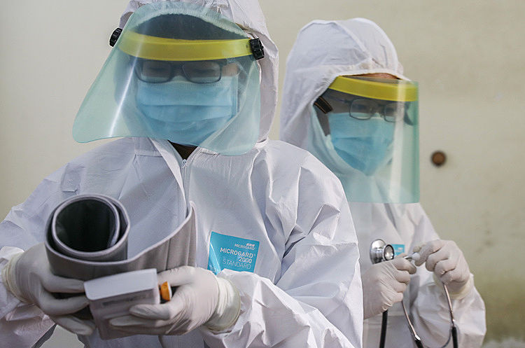 Các bác sĩ làm việc tại Bệnh viện dã chiến tại xã Nhuận Đức, huyện Củ Chi.iễm nCoV.Ảnh: Quỳnh Trần