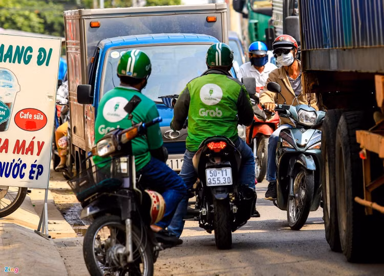 Grab noi nghe xe om khong co tinh chat kinh doanh dung hay sai? anh 2