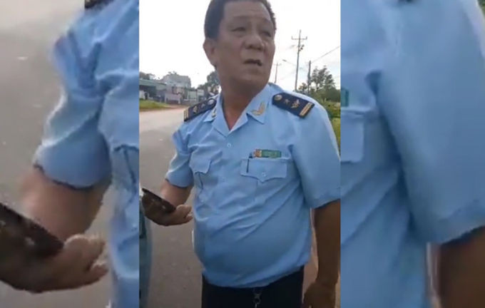 Ông Vệ lúc bị người dân chặn lại. Ảnh: Camera người dân cung cấp