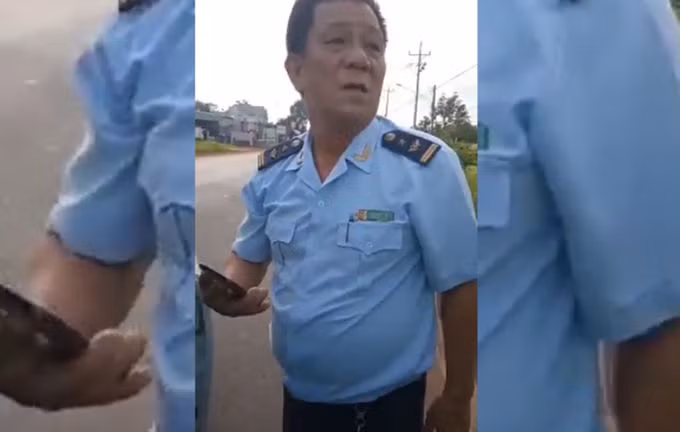 Ông Vệ lúc bị người dân chặn lại. Ảnh: Camera người dân cung cấp