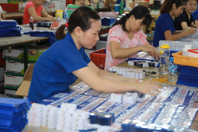 4 quy định mới về tiền lương có hiệu lực từ 1-2-2021 - Ảnh 3.