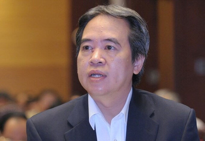 Ông Nguyễn Văn Bình trong một lần trả lời chất vấn của Quốc hội trên vai trò Thống đốc Ngân hàng Nhà nước, tháng 11/2013. Ảnh: Hoàng Phong