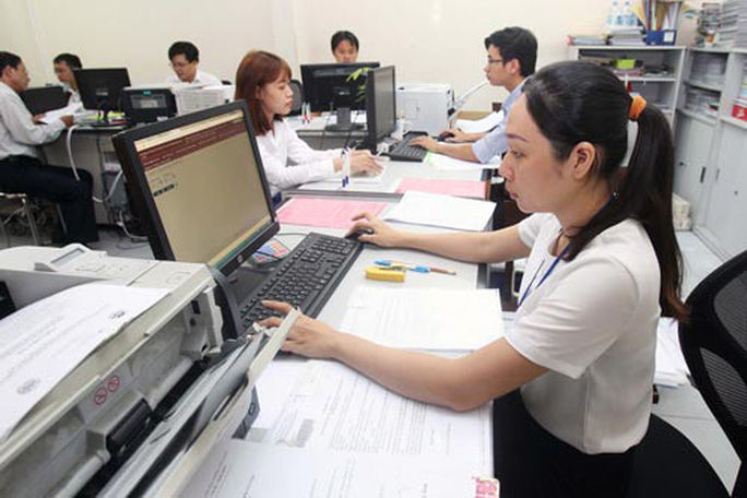 Viên chức có thể được làm ngoài với công ty khác - Ảnh 1.