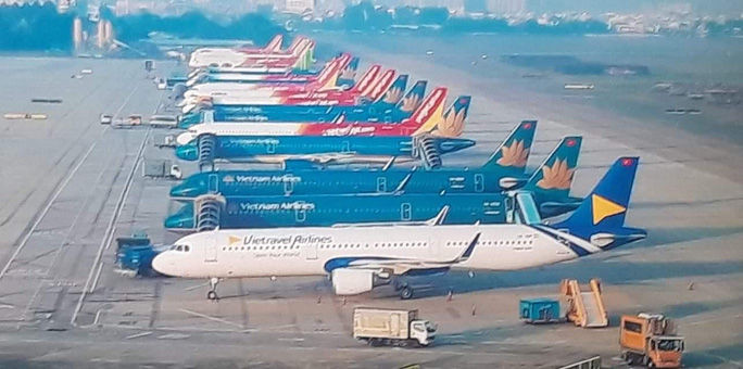 Cận cảnh máy bay đầu tiên và dàn tiếp viên của Vietravel Airlines ở sân bay Tân Sơn Nhất - Ảnh 10.