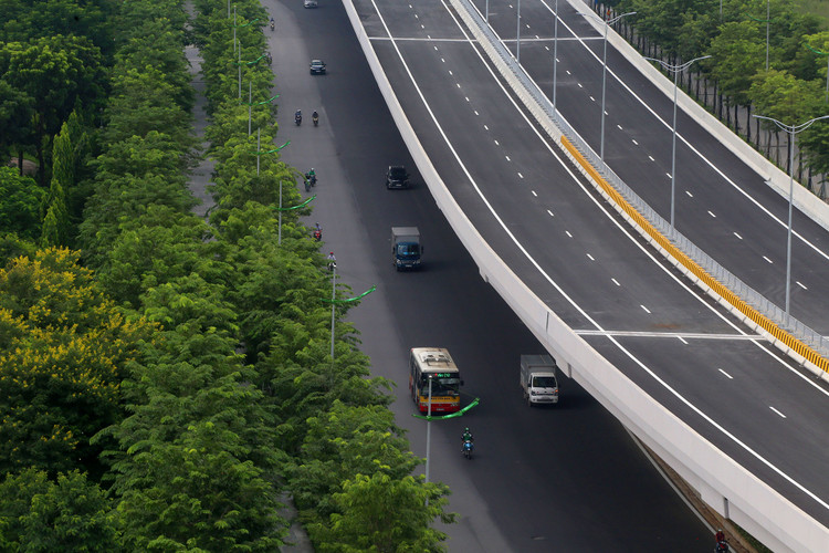 Đường Phạm Văn Đồng mở rộng thành 12 làn xe ảnh 8