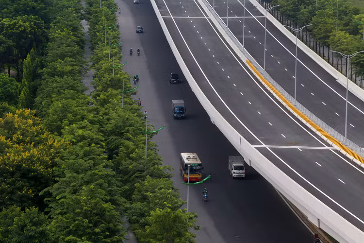 Đường Phạm Văn Đồng mở rộng thành 12 làn xe ảnh 8