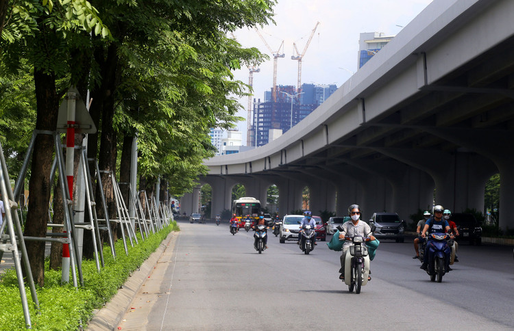 Đường Phạm Văn Đồng mở rộng thành 12 làn xe ảnh 10