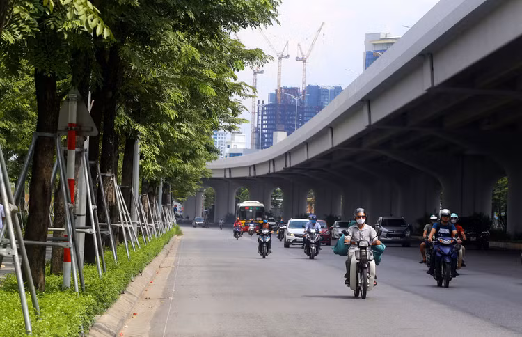 Đường Phạm Văn Đồng mở rộng thành 12 làn xe ảnh 10