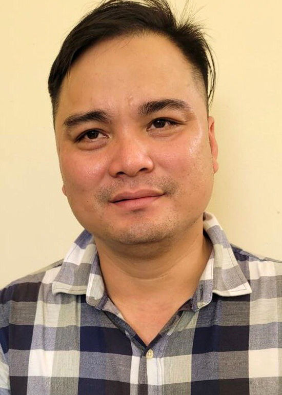 Lê Chí Thành tại cơ quan điều tra. Ảnh: Công an cung cấp.