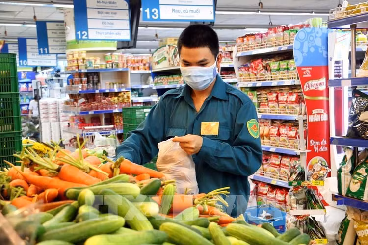 TP.HCM: Từ tuần sau người dân quận 7 và huyện Củ Chi được đi chợ 1 lần/tuần - 1