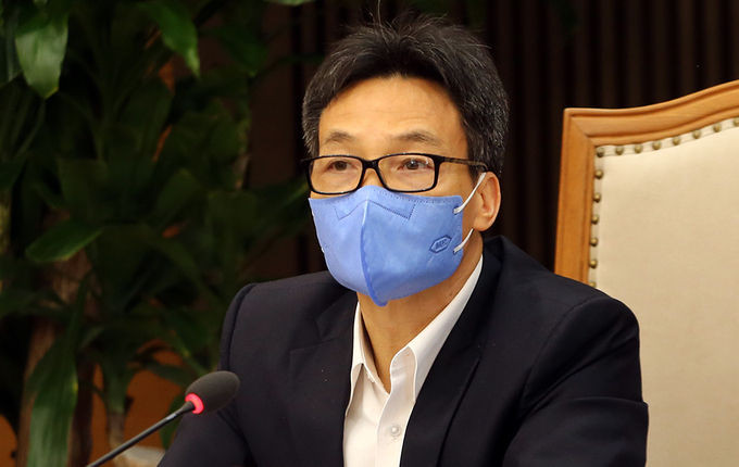 Phó thủ tướng Vũ Đức Đam chủ trì họp Ban chỉ đạo Quốc gia phòng, chống Covid-19, chiều 12/3. Ảnh: Đình Nam