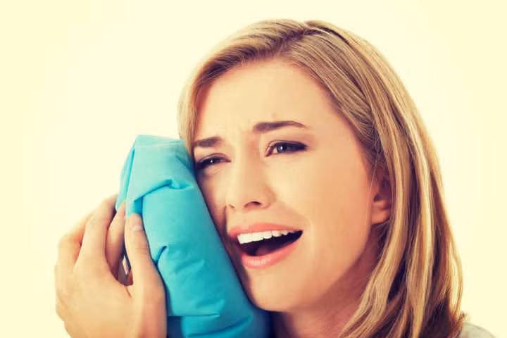 11 cách giúp bạn dịu cơn đau do mọc răng khôn hình 3 11 cach giup ban diu con dau do moc rang khon hinh 3