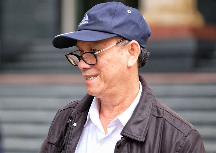 Cựu chủ tịch UBND Đà Nẵng Trần Văn Minh hầu tòa tại TAND Hà Nội. Ảnh: Giang Huy