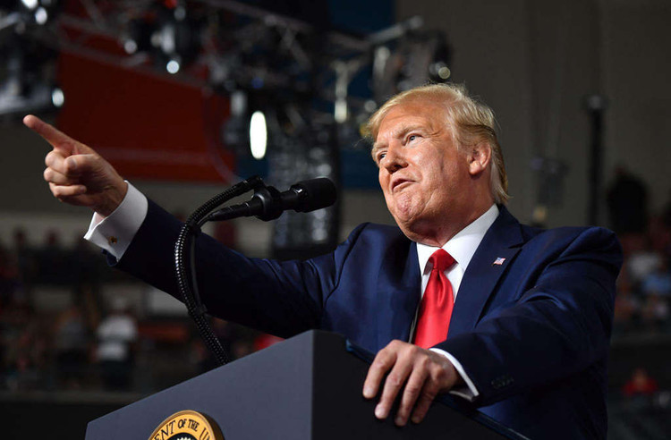 Ra lenh cong ty My roi Trung Quoc, TT Trump khong chi doa suong hinh anh 2 