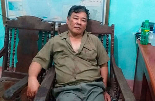 Ông Hồng khi bị bắt. Ảnh: Công an cung cấp