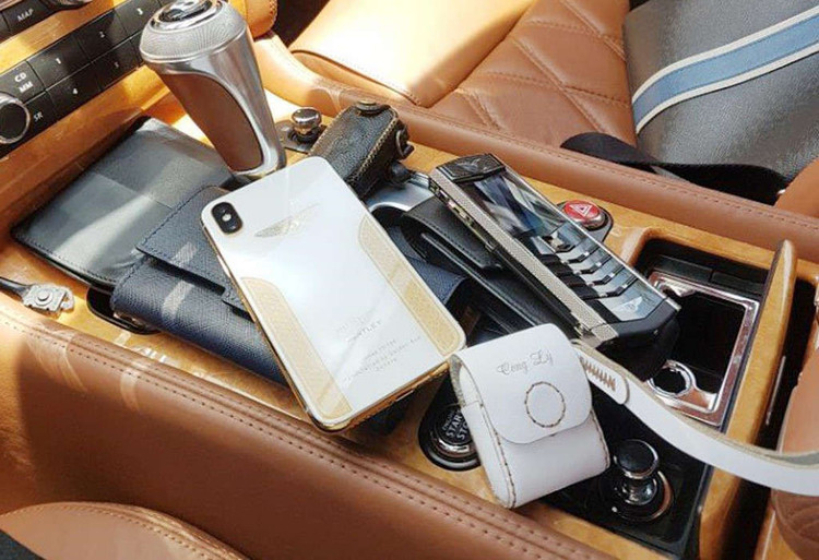 Cong ty cua 'thieu gia' vua bi bat tung tang Ca Mau 2 xe Lexus hinh anh 3 