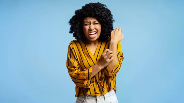 woman-scratching-itchy-arm.jpg