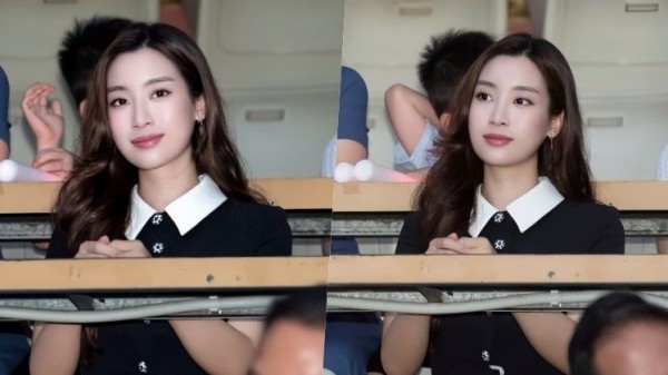 Hoa hậu Đỗ Mỹ Linh đẹp dịu dàng đi xem khai mạc giải bóng đá