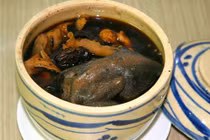 Thịt gà ác chữa di tinh, kinh nguyệt kém