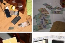 Cơ quan chức năng thu giữ tang vật liên quan đến vụ án.