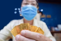 Giá vàng tăng vọt, vượt mốc 57 triệu đồng