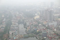 Chất lượng không khí xấu, Hà Nội chìm trong sương mù