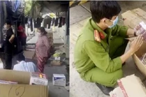 Lực lượng chức năng kiểm tra số hàng hóa nghi nhập lậu trên xe.