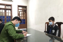 Đối tượng Đặng Hữu Tính tại cơ quan công an.