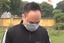 Ninh Đắc Huân tại cơ quan công an