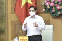 Thủ tướng làm việc với các nhà sản xuất vaccine phòng COVID-19