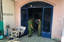 Cơ quan chức năng khám nghiệm hiện trường vụ cháy