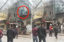 Người đàn ông "tay không, chân đất" cứu em bé khỏi đám cháy, dân mạng trầm trồ