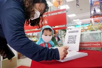 Quét mã QR: Nơi quản chặt, chỗ phớt lờ